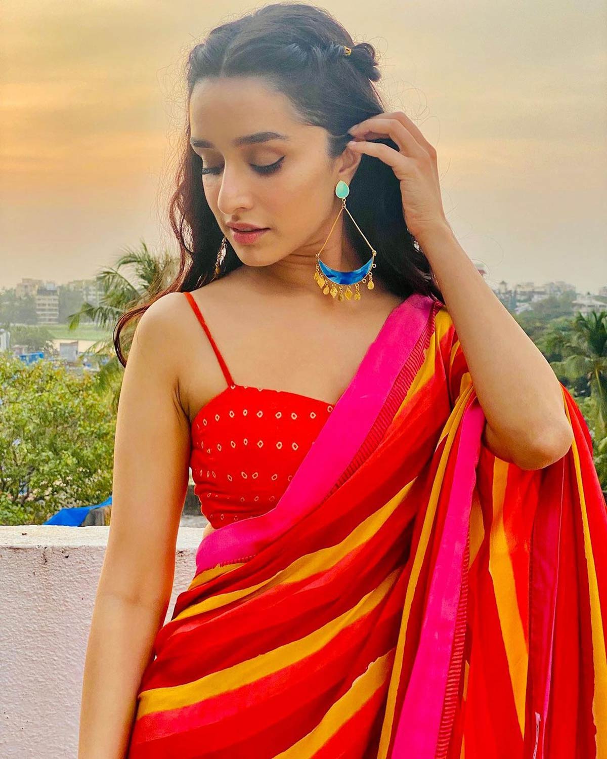 Shraddha Kapoor in red saree with backless blouse sets festive