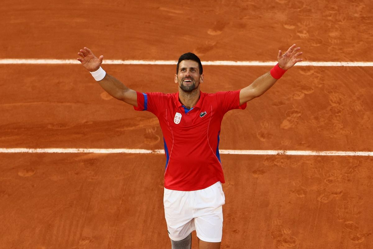 Serbia's Novak Djokovic celebrates victory over Italy's Lorenzo Musetti in the Olympics men's singles tennis semi-finals at Roland Garros stadium, Paris, on Friday.