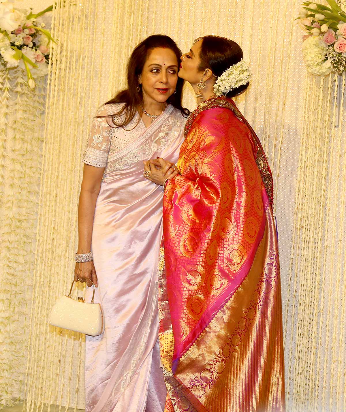 Why Is Rekha Kissing Hema Malini?