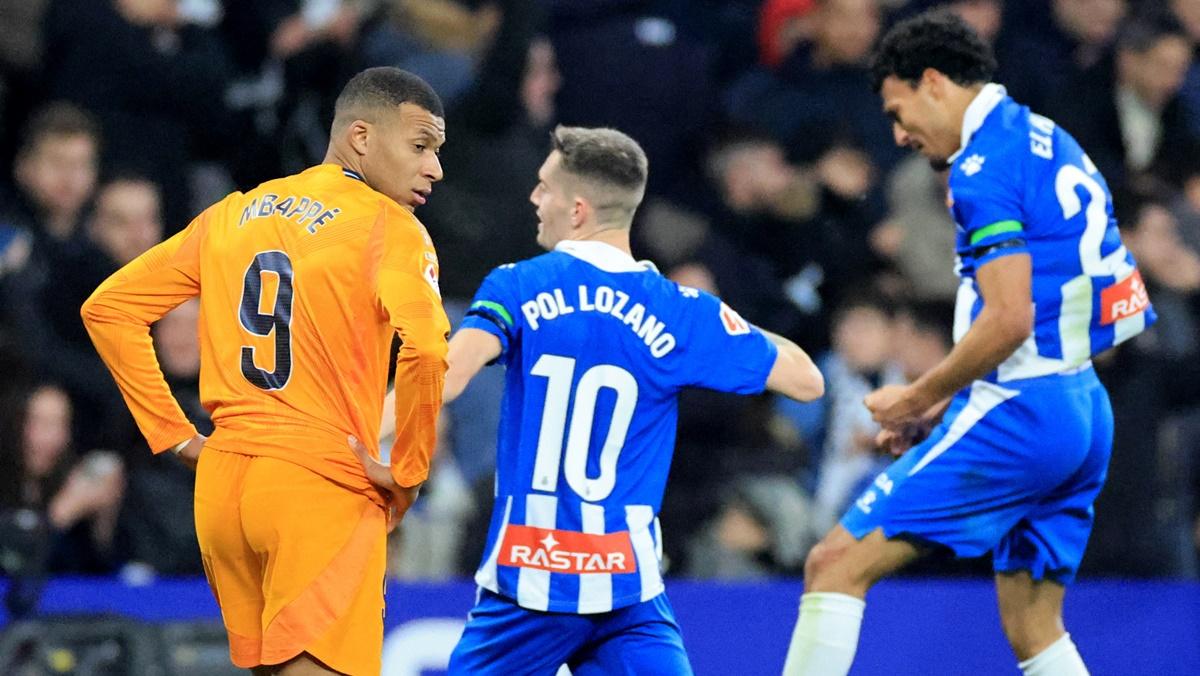 Real Madrid's Kylian Mbappe reacts as Carlos Romero celebrates scoring the match-winner for Espanyol in the LaLiga match at RCDE Stadium, Cornella de Llobregat, Spain, on Saturday.