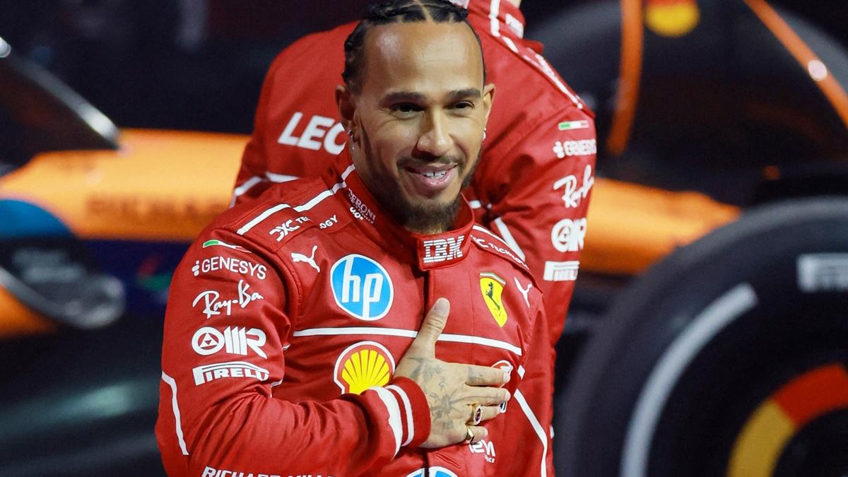 Lewis Hamilton acknowledges the rapturous applause from fans as he steps on stage at London’s O2 arena as a Ferrari driver during the F1 10-team season launch on Tuesday evening.