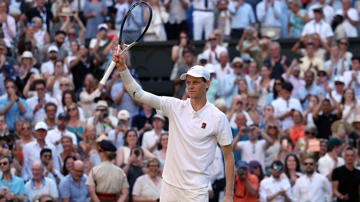 Italy's Jannik Sinner celebrates victory over Serbia's Novak Djokovic in the Wimbledon semi-finals at the All England Lawn Tennis and Croquet Club, London, on Friday.