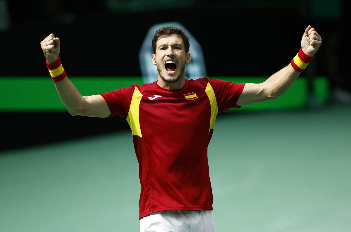 Spain's Pablo Carreno Busta celebrates after winning the opening singles against Germany's Jan-Lennard Struff.
