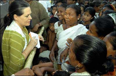 Sonia Gandhi with flood victims