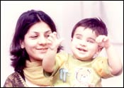 Talha with his mother, Kanwal