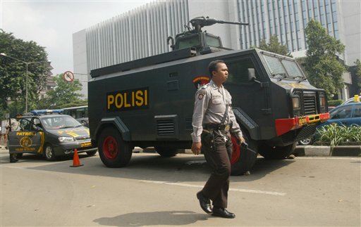 Security outside the Australian Embassy in Jakarta was stepped up after some unknown powder was sent to the Australian foreign minister's office. (AP Photo)