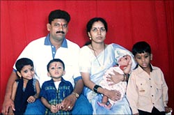 Shashikant Badekar, his wife Jayshree and their kids.