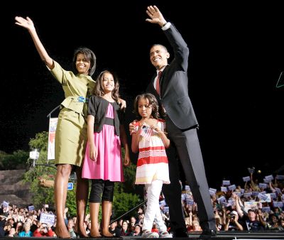 Democratic presidential hopeful Senator Barack Obama, with wife Michelle and their daughters Sasha and Malia, at a rally in Des Moines, Iowa on Tuesday.