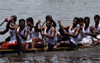 Rowers in a snake boat at the Nehru trophy boat race