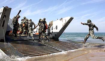 Soldiers with the navy's Landing Craft Mechanised vehicle during a war exercise.