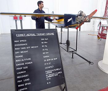 Pakistani air force technicians work on a unmanned spy Comet Aerial Target Drone aircraft