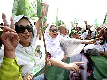 Pakistan Muslim League supporters celebrate Iftikhar Chaudhry's reinstatement as chief justice.