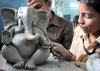School children make eco-friendly-Ganeshas