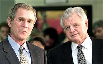 President George W Bush with Ted Kennedy at an elementary school in Washington, DC