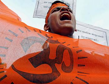 An activist from VHP, a Hindu hardline group, shouts slogans during an election awareness campaign