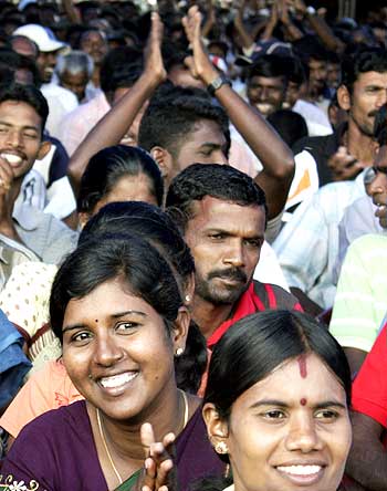 Lankan Tamil IDPs react when they hear news that they can leave the camp at Vavuniya