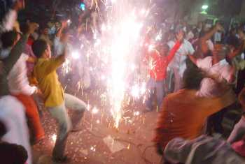 TRS supportrs burst crackers after the Centre gave the nod for a separate state
