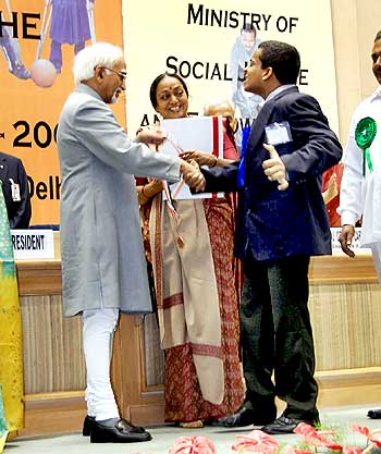 Siddharth winning the best employee award from the ministry of social justice and empowerment