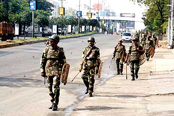 Security personnel patrol Hyderabad's streets