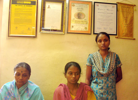 Omble's wife, Tarabai, left, with daughters Vandana and Vaishali.