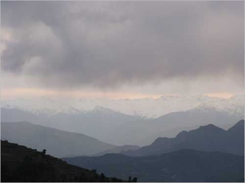 The majestic snowscaped mountains of Himalaya are kissed by the monsoon clouds.