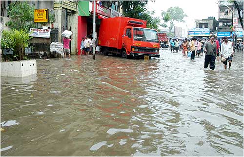 A transport vehicle that broke down in a flooded street