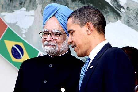 me Minister, Dr. Manmohan Singh with the US President, Mr. Barack Obama during the Junior 8 Meeting, in L'Aquila, Italy