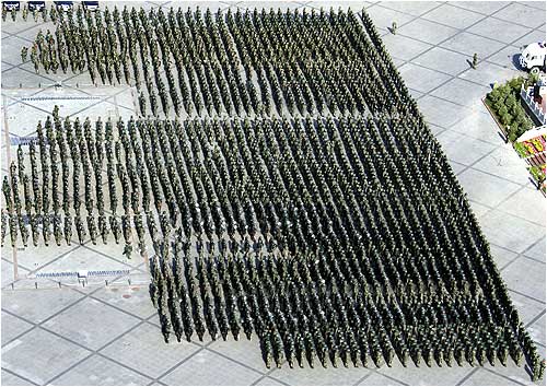 Chinese soldiers stand in formation