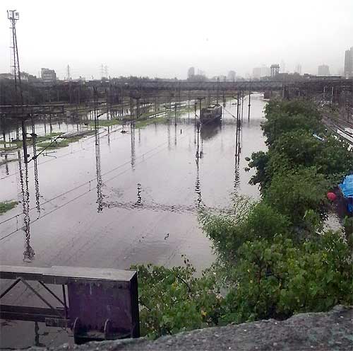 A view of the flooded Wadala railway station on Tuesday morning