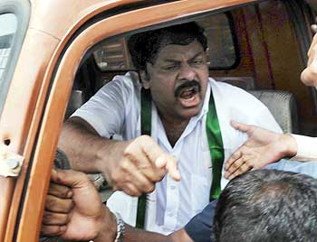 Chiranjeevi exhorts his supporters even as he is taken away from the venue in a vehicle
