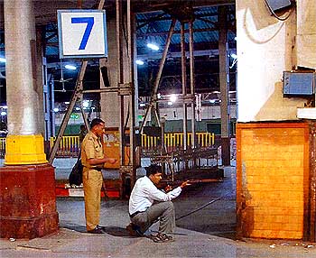Inspector Ambadas Pawar fires at the terrorists at the Chhatrapati Shivaji Terminus during 26/11