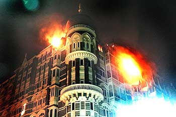 The Taj Mahal hotel is engulfed by flames during the operation to flush out the terrorists