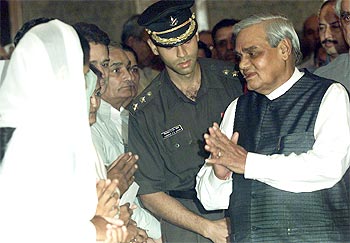 Former Prime Minister A B Vajpayee meets Kargil widows in New Delhi in July 2001