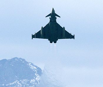An EADS Eurofighter Typhoon jet takes off in front of the Mount Pilatus at the Swiss Army Airbase in Emmen, central Switzerland