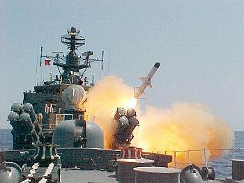 The INS Brahmaputra test-fires a surface to surface missile
