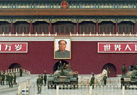 The Chinese People's Liberation Army guards the Gate of Heavenly Peace and Chairman's Mao portait in Tiananmen Square on June 9, 1989