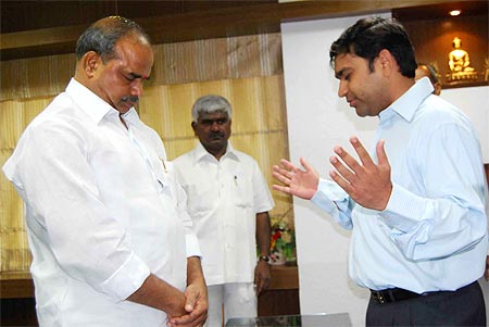 YSR with a pastor in his office