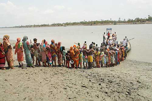 Villagers queue up for drinking water at Khulna in Sunderbans