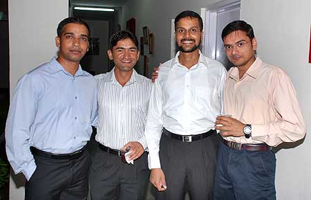 Singh, left, with Sandeep Unnikrishnan (2nd from right), who died in the attack, P V Manish (right)