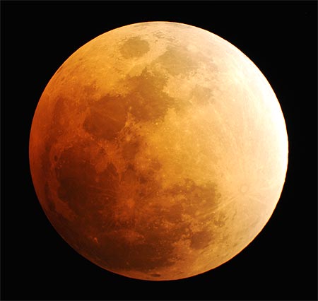 The moon is seen, during a phase of a total lunar eclipse.