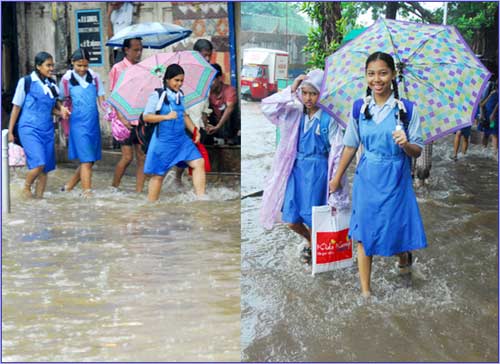 School children enjoying the rains.