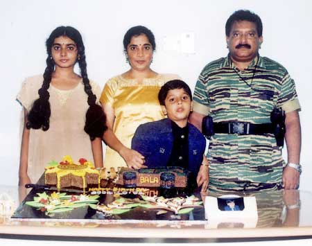 An undated photograph supplied by the Sri Lankan Ministry of Defence shows the Liberation Tigers of Tamil Eelam leader Vellupillai Prabhakaran standing with his wife Mathivathani, his son Balachandran and his daughter Duwaraka from a collection of photographs that government soldiers said they discovered recently in a hideout in northern Sri Lanka