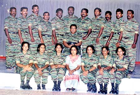 Prabhakaran (Centre) and his wife Mathivathani (front row, Centre) sitting with LTTE soldiers