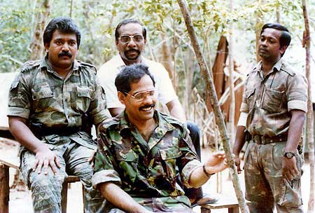 Prabhakaran (Left) with other LTTE members