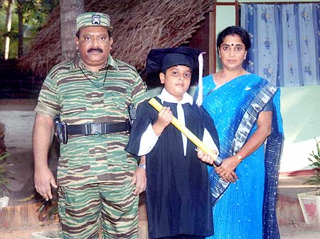 Prabhakaran with his son Balachandran and wife Mathivathani