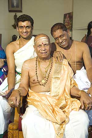 Ashtanga yoga guru K.Pattabhi Jois with son Manju (right) and grandson Sharath Rangaswamy