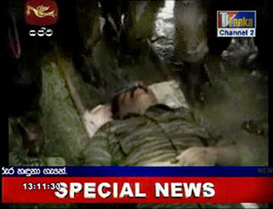 The video frame grab shows the body of Prabhakaran