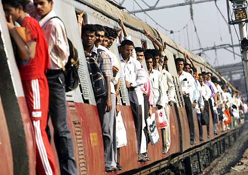 Commuters travel in a suburban train