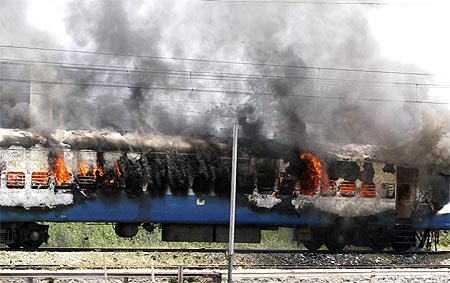 A passenger train was torched by protestors in Jalandhar