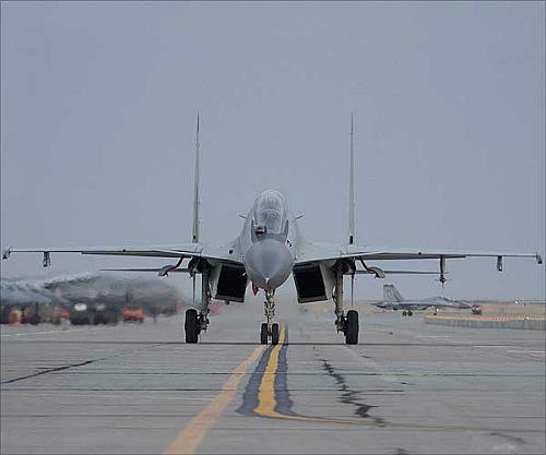 A head on view of the SU-30 MKI as it taxis down towards the runway